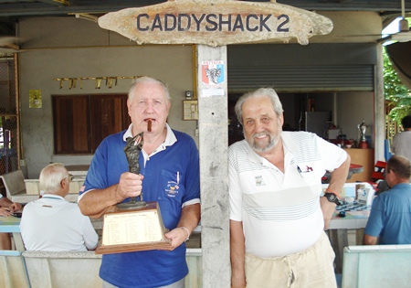 Monthly winner Paul Kraft, left, with Joe St. Laurent.